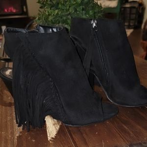 Adorable fringe booties